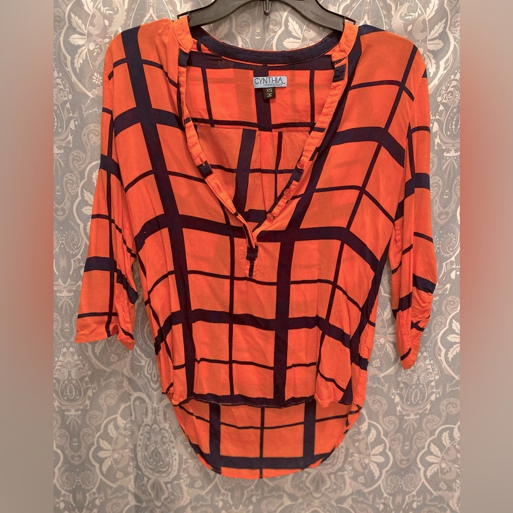 Cynthia Rowley hi low blouse. 3/4 sleeve dark peach and navy. Size xs